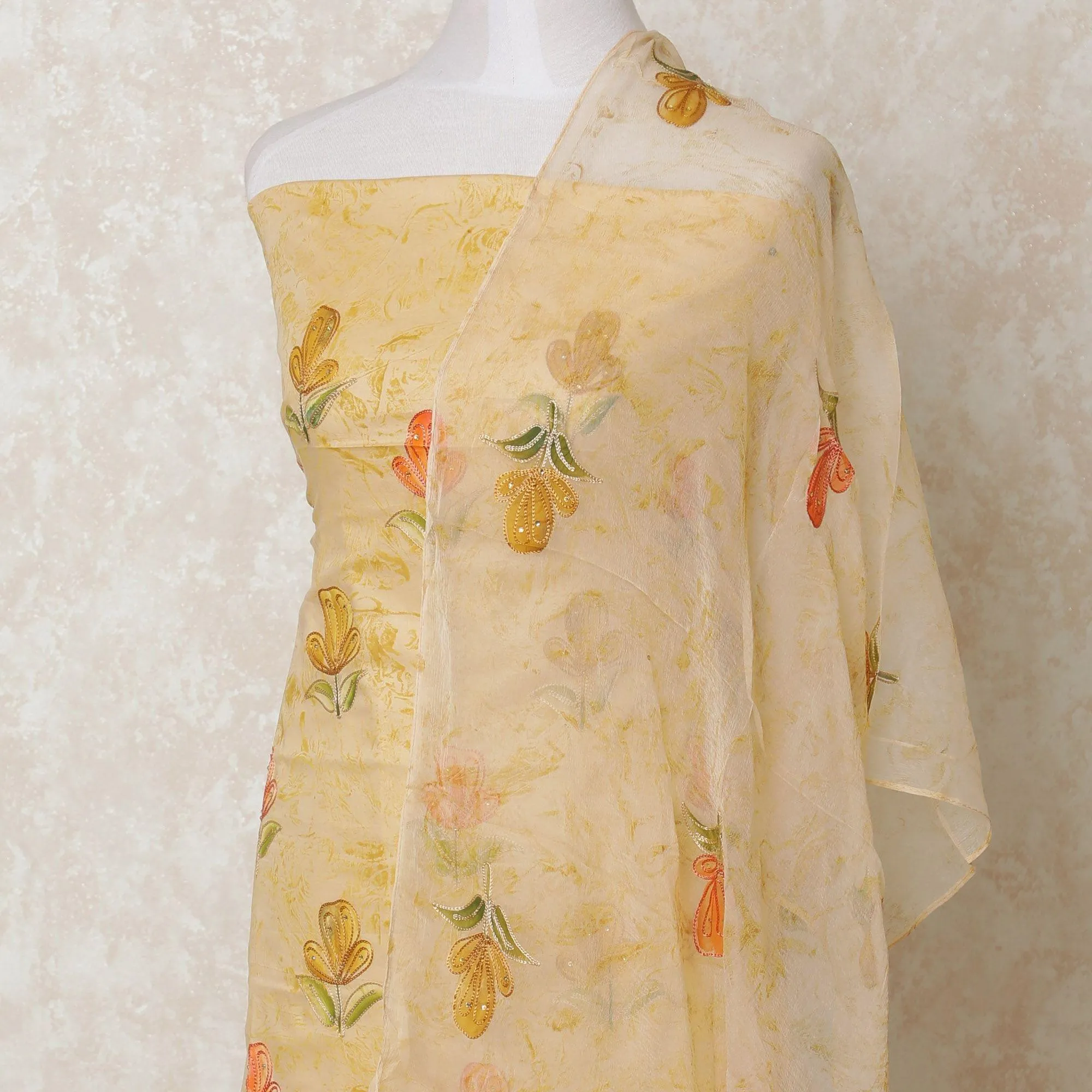 Light beige blended cotton lawn fabric with same tone embroidery having multicolor print and stone work in floral design-D12112